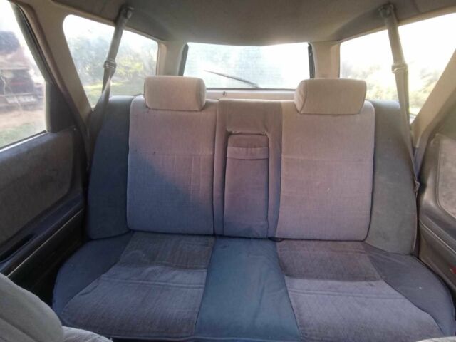 Серый Мазда 626, объемом двигателя 2 л и пробегом 100 тыс. км за 650 $, фото 5 на Automoto.ua