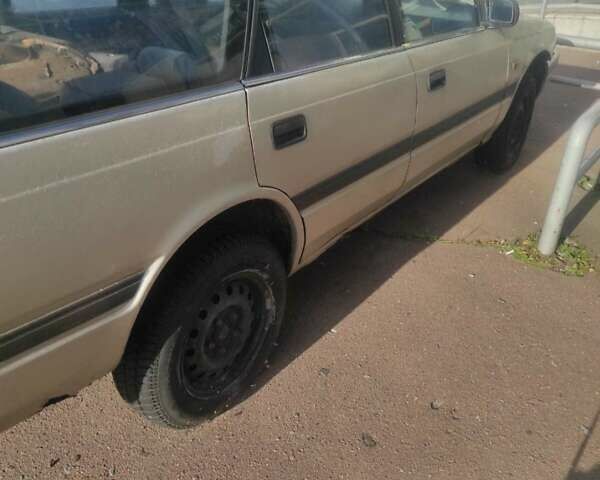 Сірий Мазда 626, об'ємом двигуна 2 л та пробігом 200 тис. км за 900 $, фото 3 на Automoto.ua