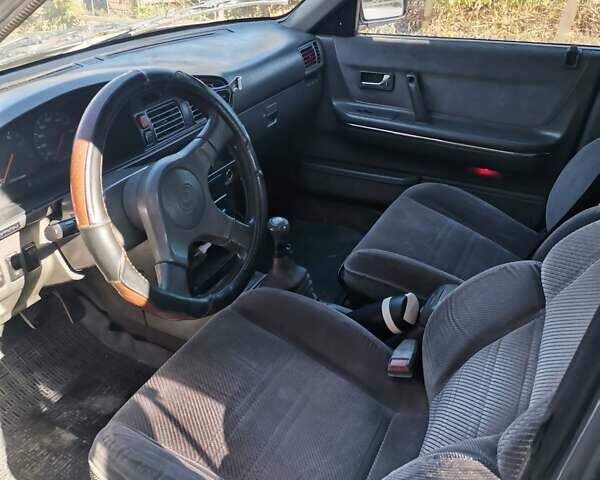 Серый Мазда 626, объемом двигателя 2 л и пробегом 620 тыс. км за 1700 $, фото 12 на Automoto.ua