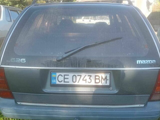 Серый Мазда 626, объемом двигателя 2 л и пробегом 100 тыс. км за 650 $, фото 1 на Automoto.ua