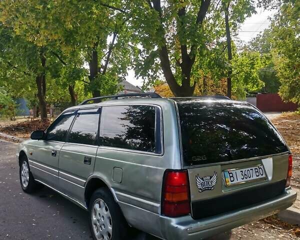 Серый Мазда 626, объемом двигателя 2 л и пробегом 620 тыс. км за 1700 $, фото 5 на Automoto.ua