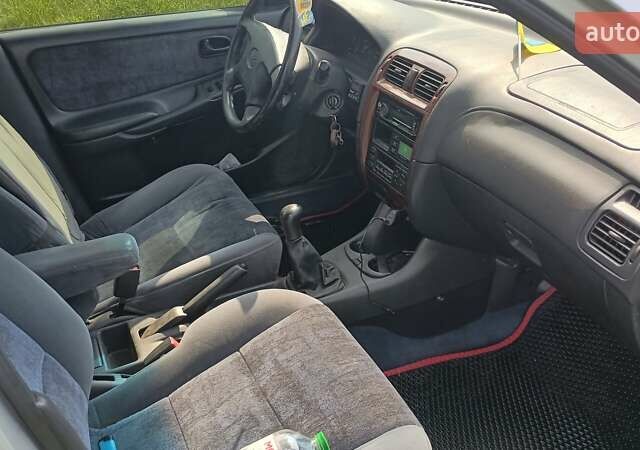 Серый Мазда 626, объемом двигателя 2 л и пробегом 270 тыс. км за 2700 $, фото 10 на Automoto.ua