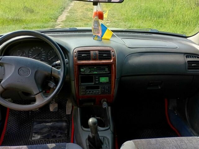 Серый Мазда 626, объемом двигателя 2 л и пробегом 270 тыс. км за 2700 $, фото 7 на Automoto.ua