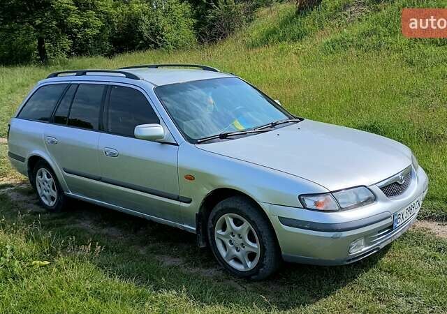 Серый Мазда 626, объемом двигателя 2 л и пробегом 270 тыс. км за 2700 $, фото 1 на Automoto.ua