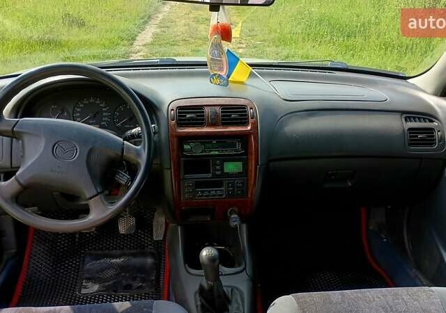 Серый Мазда 626, объемом двигателя 2 л и пробегом 270 тыс. км за 2700 $, фото 8 на Automoto.ua