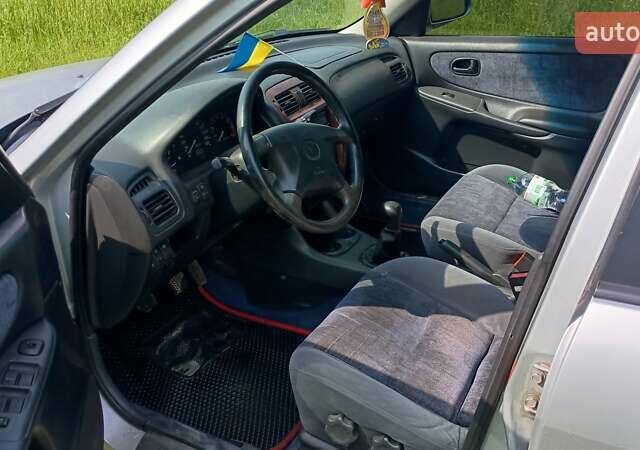 Серый Мазда 626, объемом двигателя 2 л и пробегом 270 тыс. км за 2700 $, фото 5 на Automoto.ua