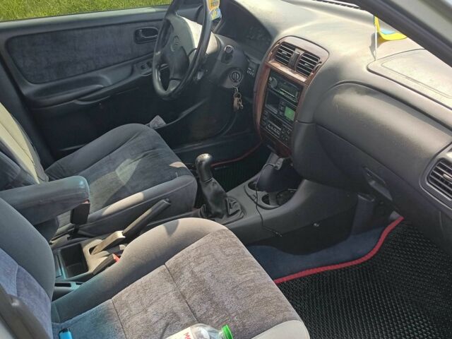 Серый Мазда 626, объемом двигателя 2 л и пробегом 270 тыс. км за 2700 $, фото 9 на Automoto.ua