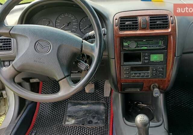 Серый Мазда 626, объемом двигателя 2 л и пробегом 270 тыс. км за 2700 $, фото 7 на Automoto.ua