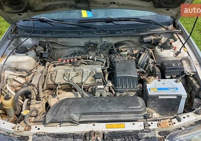 Серый Мазда 626, объемом двигателя 2 л и пробегом 270 тыс. км за 2700 $, фото 13 на Automoto.ua