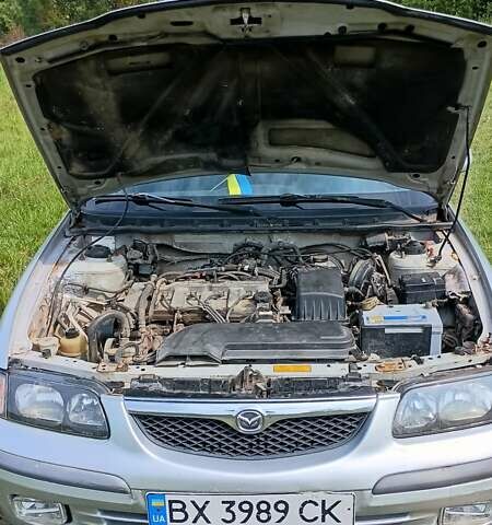 Серый Мазда 626, объемом двигателя 2 л и пробегом 270 тыс. км за 2700 $, фото 12 на Automoto.ua