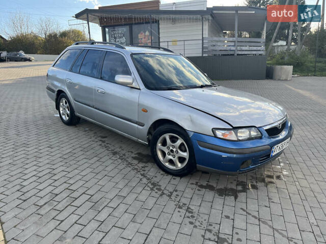 Серый Мазда 626, объемом двигателя 1.8 л и пробегом 238 тыс. км за 2100 $, фото 7 на Automoto.ua