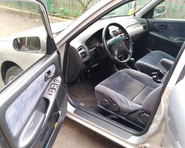 Серый Мазда 626, объемом двигателя 2 л и пробегом 440 тыс. км за 2700 $, фото 7 на Automoto.ua