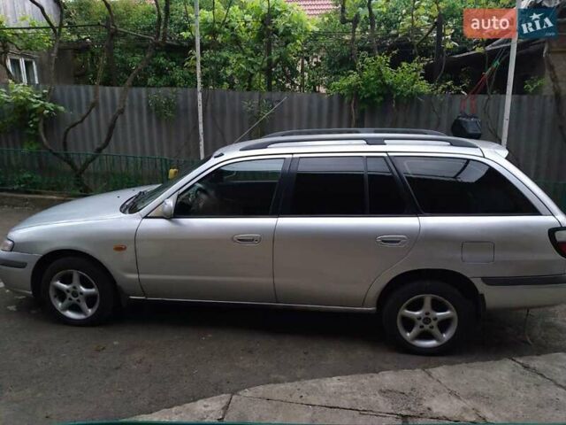 Серый Мазда 626, объемом двигателя 2 л и пробегом 440 тыс. км за 2700 $, фото 1 на Automoto.ua