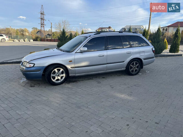 Серый Мазда 626, объемом двигателя 1.8 л и пробегом 238 тыс. км за 2100 $, фото 2 на Automoto.ua