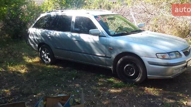 Серый Мазда 626, объемом двигателя 2 л и пробегом 250 тыс. км за 1800 $, фото 5 на Automoto.ua