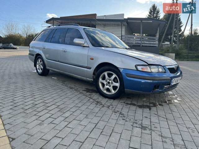 Серый Мазда 626, объемом двигателя 1.8 л и пробегом 238 тыс. км за 2100 $, фото 8 на Automoto.ua