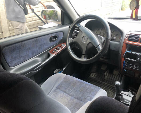 Серый Мазда 626, объемом двигателя 2 л и пробегом 123 тыс. км за 3100 $, фото 50 на Automoto.ua