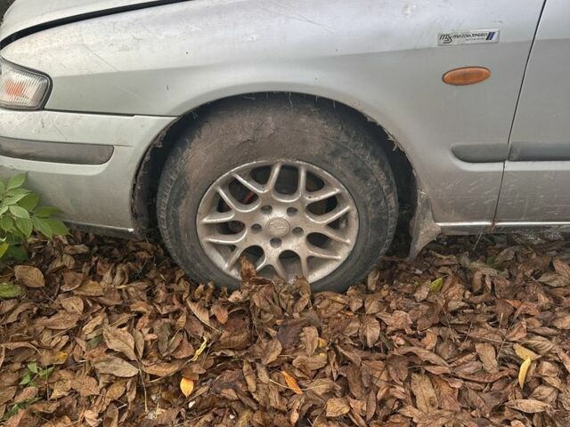 Серый Мазда 626, объемом двигателя 1.8 л и пробегом 200 тыс. км за 600 $, фото 2 на Automoto.ua