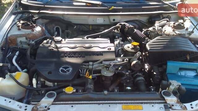 Серый Мазда 626, объемом двигателя 2 л и пробегом 250 тыс. км за 1800 $, фото 4 на Automoto.ua