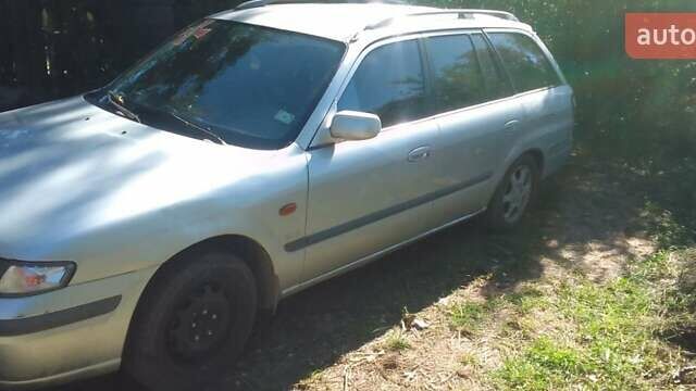 Серый Мазда 626, объемом двигателя 2 л и пробегом 250 тыс. км за 1800 $, фото 2 на Automoto.ua