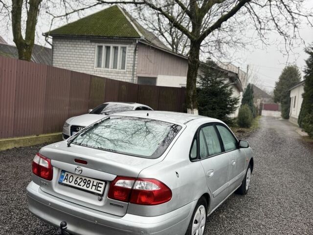 Серый Мазда 626, объемом двигателя 2 л и пробегом 220 тыс. км за 1700 $, фото 3 на Automoto.ua