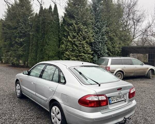 Серый Мазда 626, объемом двигателя 2 л и пробегом 220 тыс. км за 1700 $, фото 1 на Automoto.ua