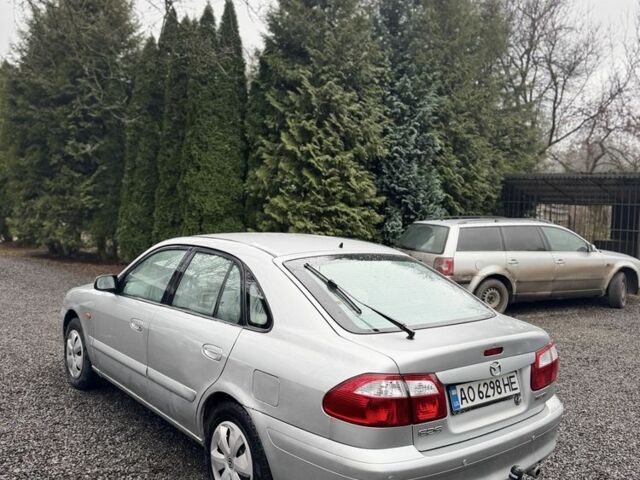 Серый Мазда 626, объемом двигателя 2 л и пробегом 220 тыс. км за 1700 $, фото 2 на Automoto.ua