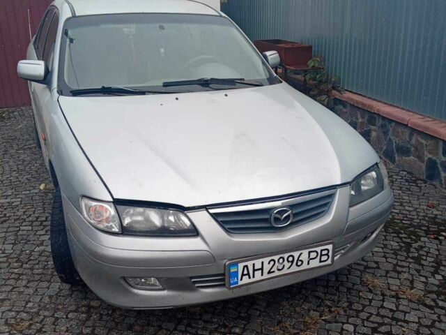 Серый Мазда 626, объемом двигателя 2 л и пробегом 300 тыс. км за 1500 $, фото 1 на Automoto.ua