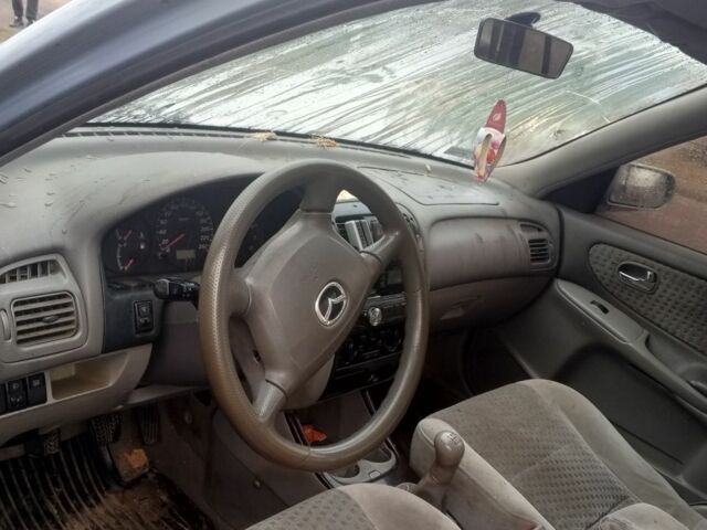 Сірий Мазда 626, об'ємом двигуна 2 л та пробігом 11 тис. км за 490 $, фото 2 на Automoto.ua