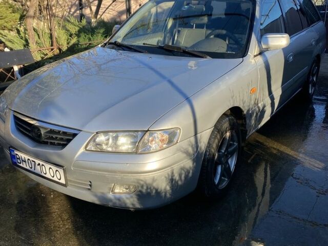 Серый Мазда 626, объемом двигателя 2 л и пробегом 260 тыс. км за 2500 $, фото 2 на Automoto.ua