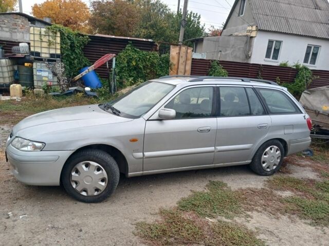 Серый Мазда 626, объемом двигателя 2 л и пробегом 350 тыс. км за 1500 $, фото 1 на Automoto.ua
