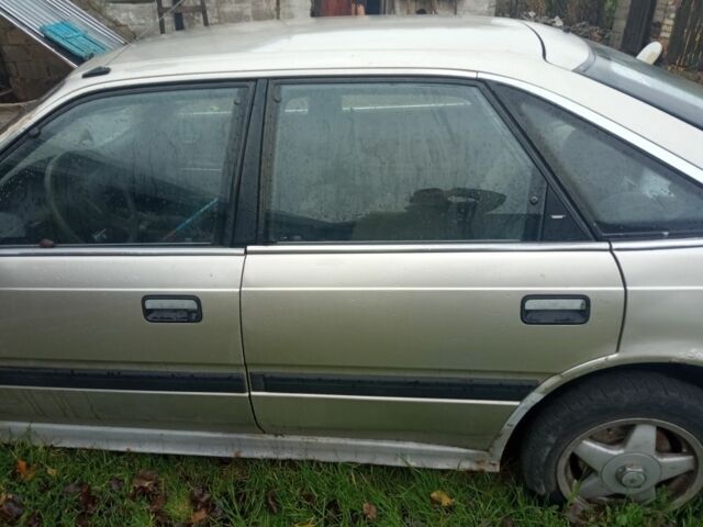 Серый Мазда 626, объемом двигателя 2 л и пробегом 500 тыс. км за 800 $, фото 6 на Automoto.ua