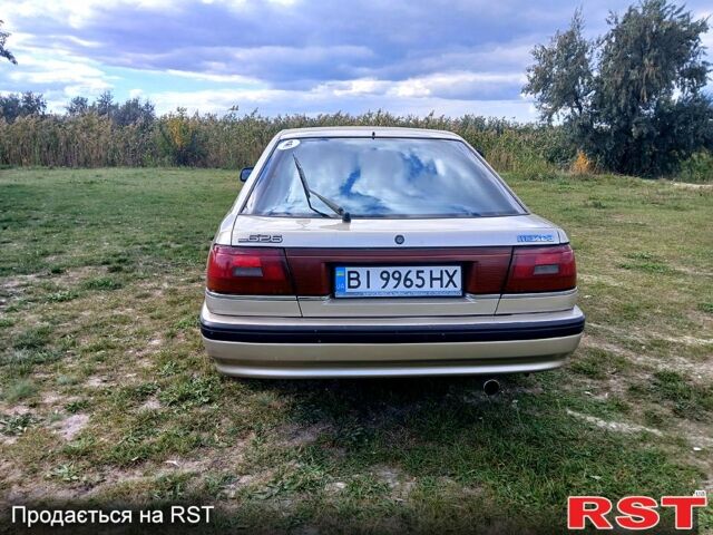 Серый Мазда 626, объемом двигателя 2 л и пробегом 370 тыс. км за 1950 $, фото 6 на Automoto.ua