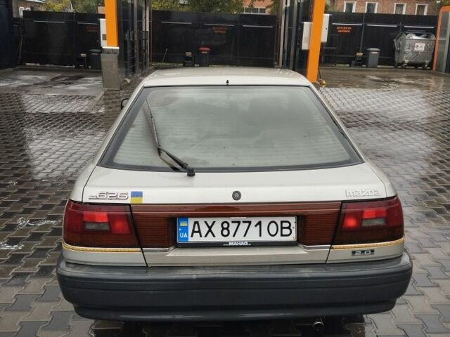 Сірий Мазда 626, об'ємом двигуна 2 л та пробігом 24 тис. км за 1191 $, фото 4 на Automoto.ua