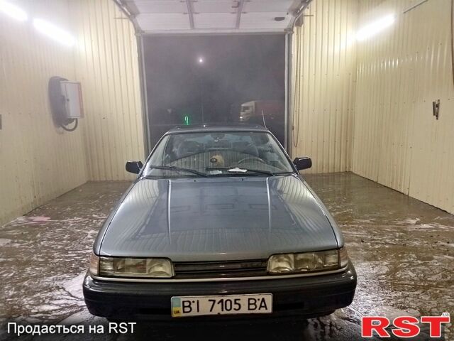 Серый Мазда 626, объемом двигателя 2.2 л и пробегом 670 тыс. км за 1000 $, фото 4 на Automoto.ua