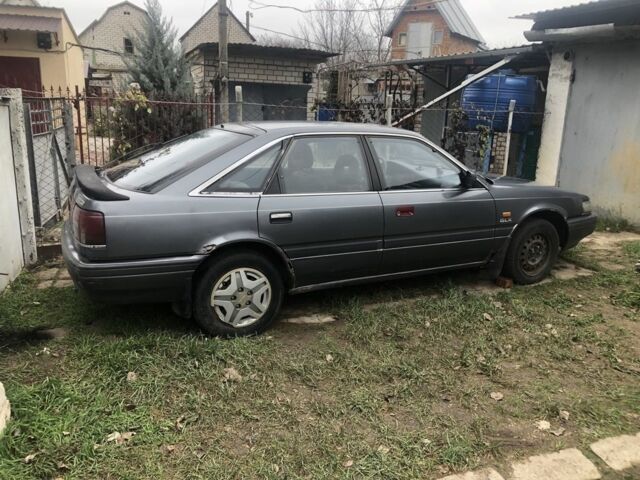 Сірий Мазда 626, об'ємом двигуна 2.2 л та пробігом 450 тис. км за 997 $, фото 3 на Automoto.ua