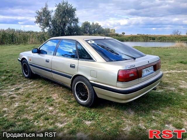 Серый Мазда 626, объемом двигателя 2 л и пробегом 370 тыс. км за 1950 $, фото 10 на Automoto.ua