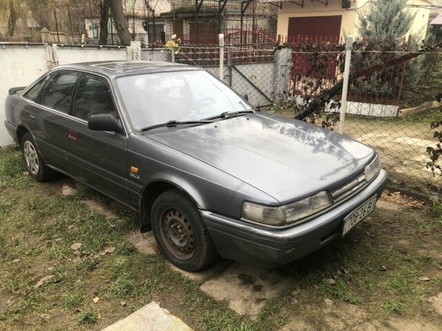 Сірий Мазда 626, об'ємом двигуна 2.2 л та пробігом 450 тис. км за 997 $, фото 1 на Automoto.ua