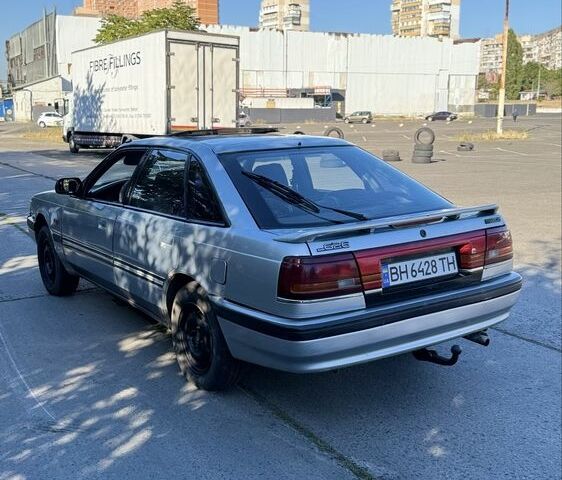 Серый Мазда 626, объемом двигателя 2 л и пробегом 370 тыс. км за 1150 $, фото 4 на Automoto.ua