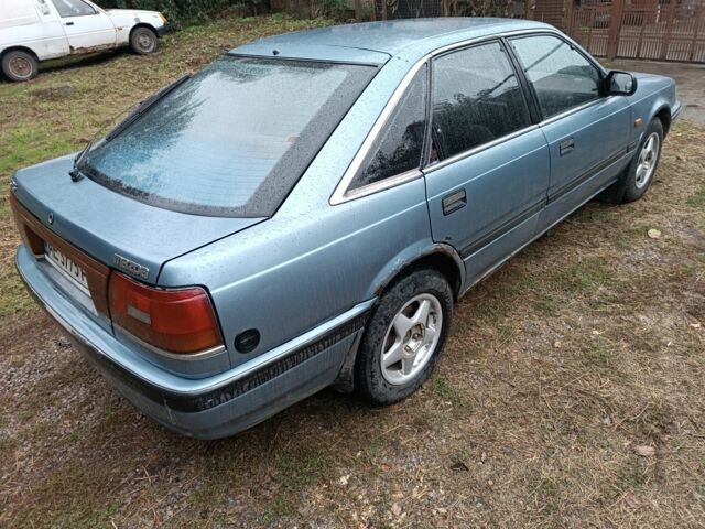 Серый Мазда 626, объемом двигателя 2 л и пробегом 380 тыс. км за 850 $, фото 2 на Automoto.ua