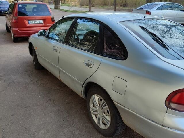 Серый Мазда 626, объемом двигателя 2 л и пробегом 347 тыс. км за 1100 $, фото 3 на Automoto.ua