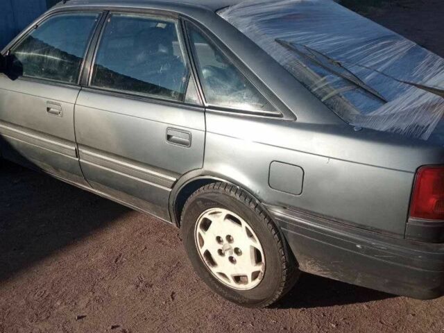 Серый Мазда 626, объемом двигателя 2 л и пробегом 400 тыс. км за 716 $, фото 3 на Automoto.ua