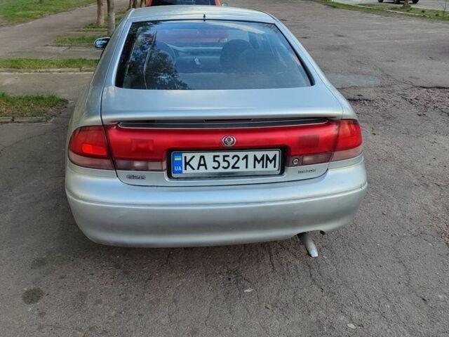 Серый Мазда 626, объемом двигателя 2 л и пробегом 347 тыс. км за 1100 $, фото 4 на Automoto.ua