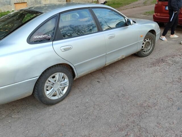 Серый Мазда 626, объемом двигателя 2 л и пробегом 347 тыс. км за 1100 $, фото 2 на Automoto.ua