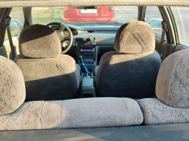 Серый Мазда 626, объемом двигателя 2 л и пробегом 347 тыс. км за 1100 $, фото 7 на Automoto.ua