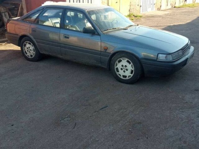 Серый Мазда 626, объемом двигателя 2 л и пробегом 400 тыс. км за 716 $, фото 1 на Automoto.ua