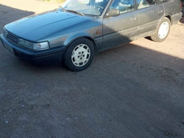 Серый Мазда 626, объемом двигателя 2 л и пробегом 400 тыс. км за 716 $, фото 4 на Automoto.ua