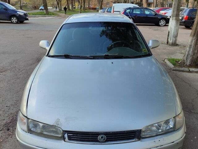 Серый Мазда 626, объемом двигателя 2 л и пробегом 347 тыс. км за 1100 $, фото 1 на Automoto.ua