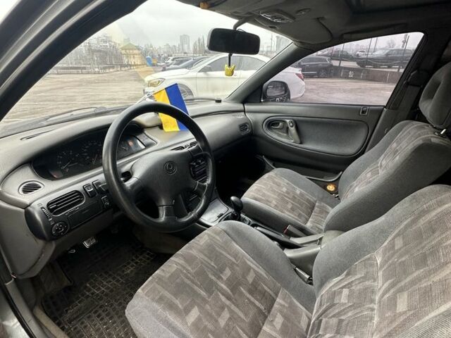 Серый Мазда 626, объемом двигателя 2.5 л и пробегом 235 тыс. км за 1500 $, фото 12 на Automoto.ua