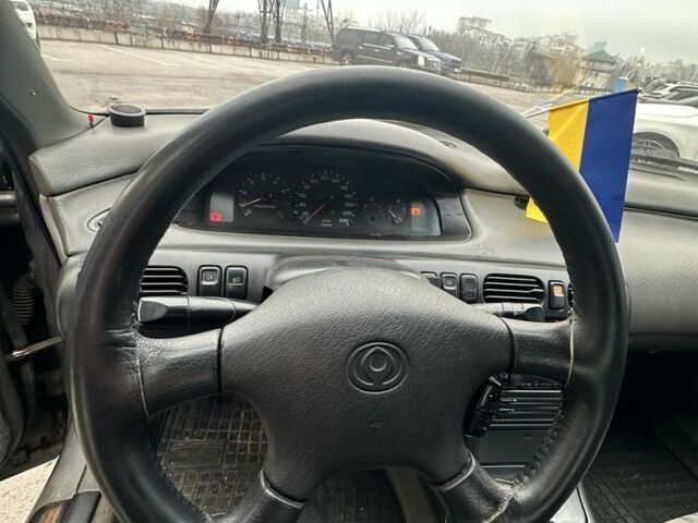 Серый Мазда 626, объемом двигателя 2.5 л и пробегом 235 тыс. км за 1500 $, фото 6 на Automoto.ua